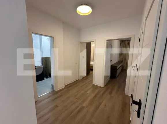 Apartament 3 camere, 71mp utili,2 bai,1 bucatarie si living open space,1 parcare