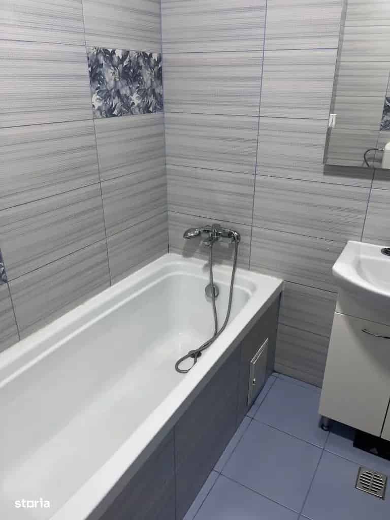 Apartament 2 camere mobilat etaj 4 bloc cu lift