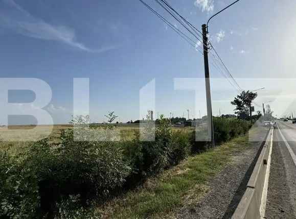 Teren intravilan 42.000 mp, deschidere 133 m la DE574, zona Aeroportului