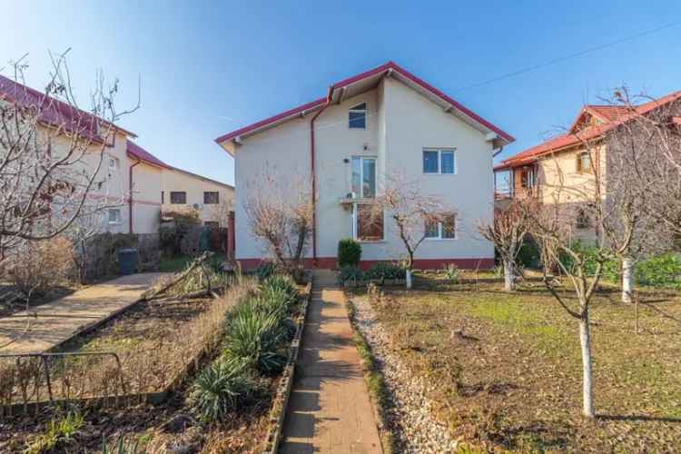 Casa de vanzare spatioasa in Domnesti cu gradina si confort modern